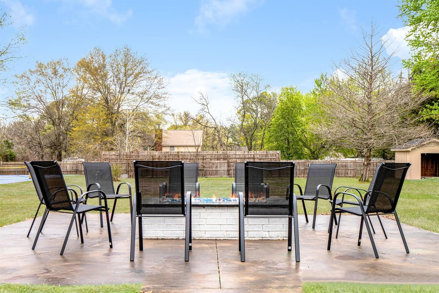 Outdoor gas fire pit with lounge seating