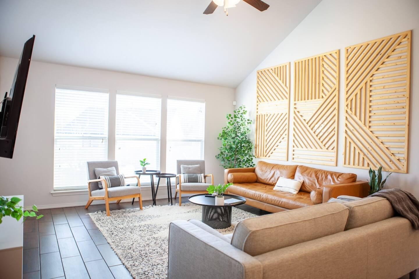 Living Room - Seating for 8. Italian leaxther couch with overstuffed cushions.
