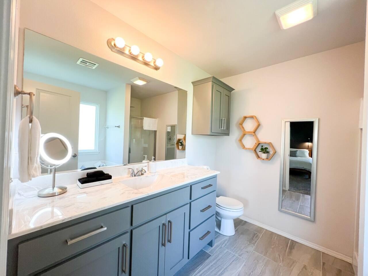 Master Bathroom: 10X Magnifying LED Makeup Mirror - Revlon Pro Hair Dryer - Black Makeup Towels